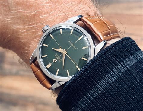 omega green face watch